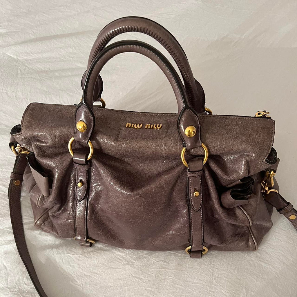 Authentic Grey Looks A Bit Purple In Person Miu Miu Vitello Leather Bow Bag With Gold Hardware And Removable Strap🤎🌆