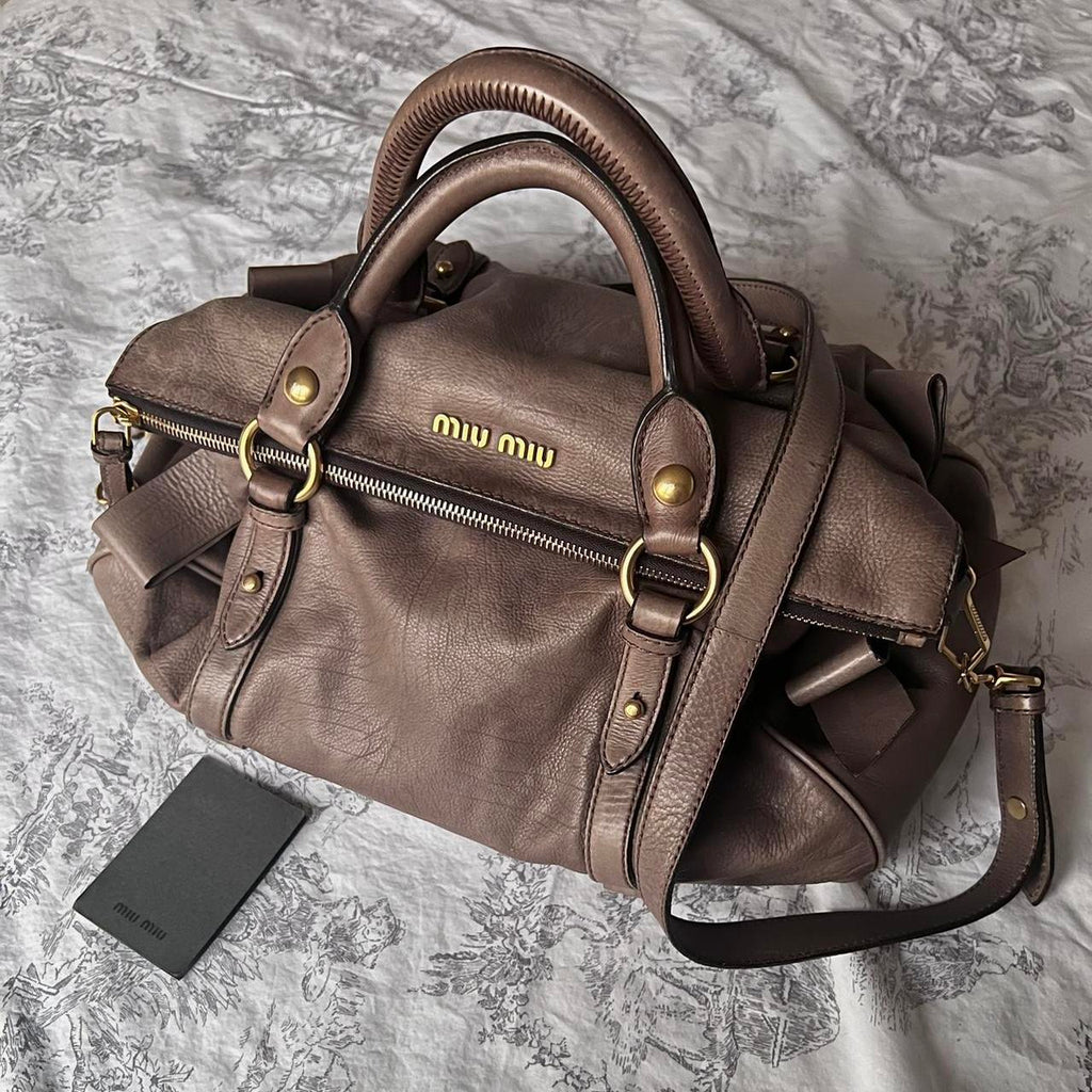 Authentic Miu Miu Purple Grey Leather Vitello Lux Bow Bag In Gold Hardware With Removable Strap🤎🌆