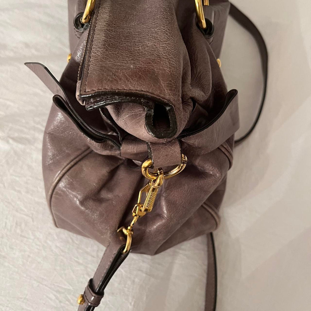 Authentic Grey Looks A Bit Purple In Person Miu Miu Vitello Leather Bow Bag With Gold Hardware And Removable Strap🤎🌆